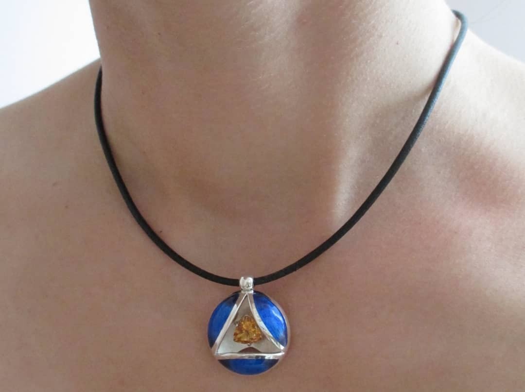 Enamelled pendant