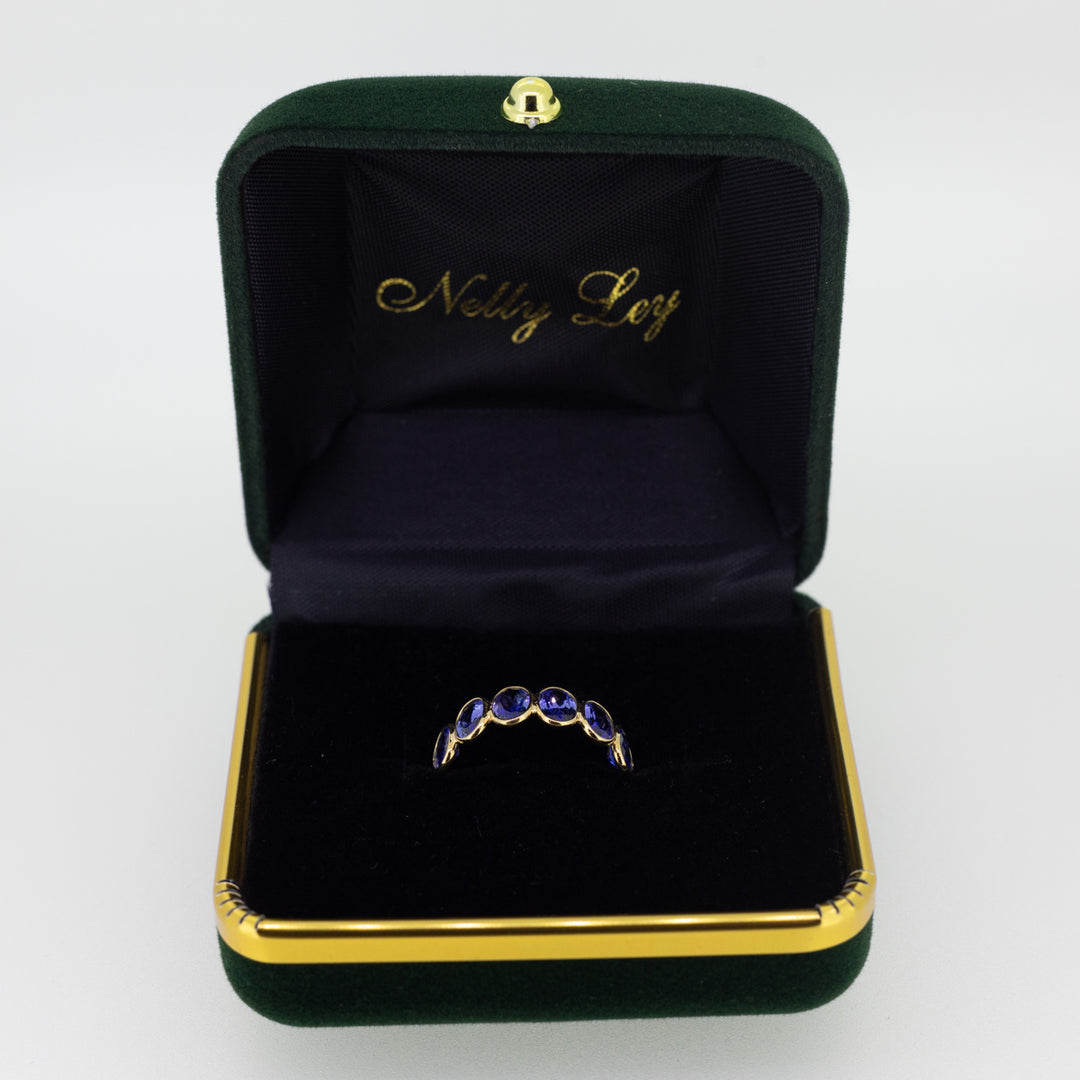 Light Blue Tanzanite Half Eternity Ring