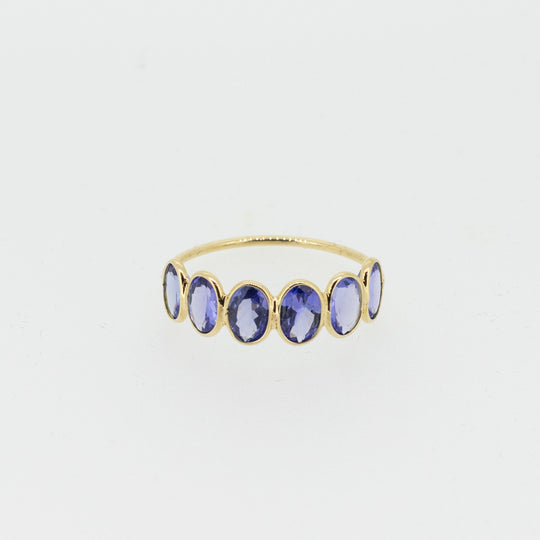 Light Blue Tanzanite Half Eternity Ring