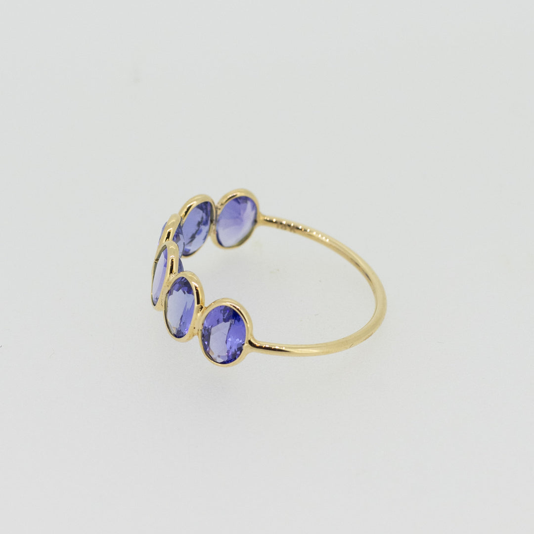Light Blue Tanzanite Half Eternity Ring