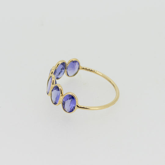 Light Blue Tanzanite Half Eternity Ring
