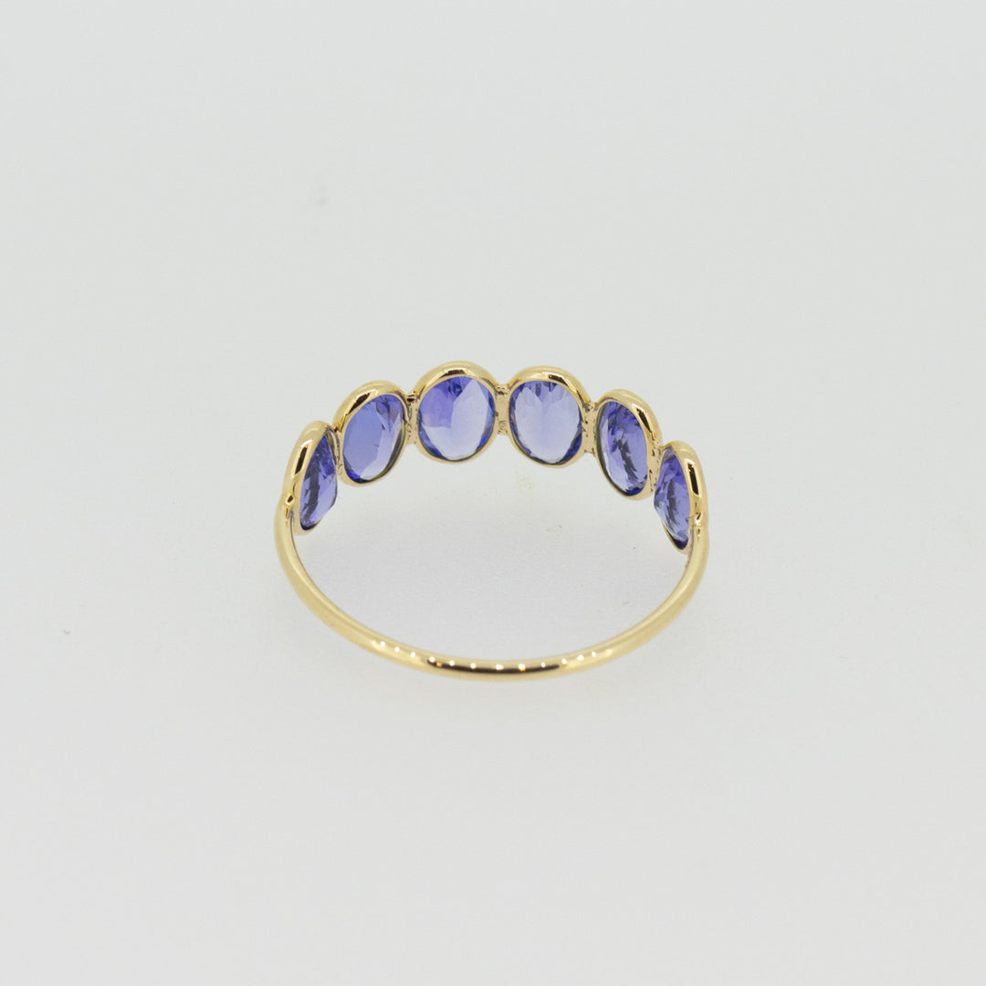 Light Blue Tanzanite Half Eternity Ring