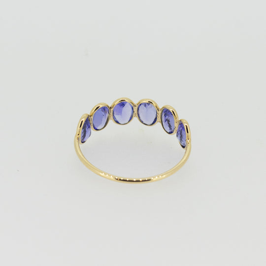 Light Blue Tanzanite Half Eternity Ring